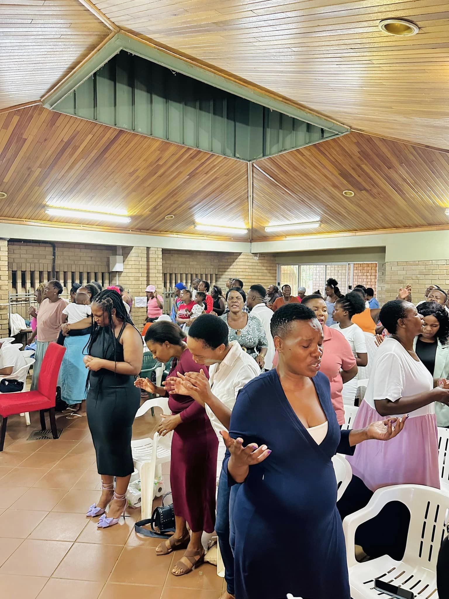 The Heavenly Grace congregation worshipping together inside the Tzaneen venue